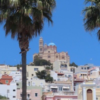 “<a href="https://www.flickr.com/photos/131701596@N07/52109891228" title="The orthodox church above Ermoupoli">The orthodox church above Ermoupoli</a>” by <a href="https://www.flickr.com/photos/131701596@N07/">Nicksy58</a>, <a href="https://creativecommons.org/licenses/by/2.0/deed.en" rel="license noopener noreferrer">CC BY 2.0</a>